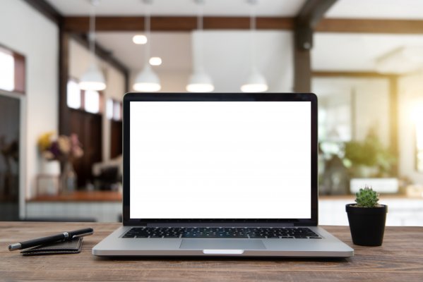 Image of blank laptop on nice bench